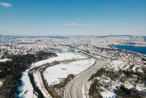 snow covered field under blue sky during daytime